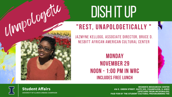 Picture of woman with dark hair and glasses smiling at camera with flowers in the background