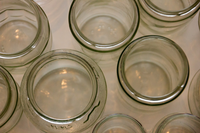 A photograph of empty glass jars.