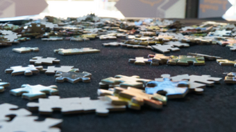 Photo of puzzle pieces on a table