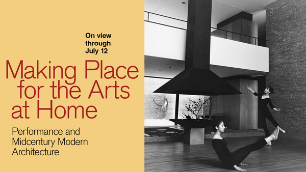 black and white historical photo of 2 dancers, performing in interior room of modern home