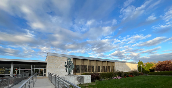 dramatic sky and clouds above modern building