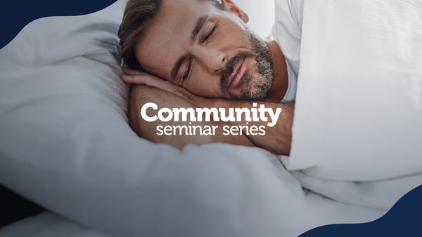 Community Seminar Series. A man sleeping.