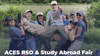 Group of students carrying two other students in front of a lake. Text reads: "ACES RSO & Study Abroad Fair"