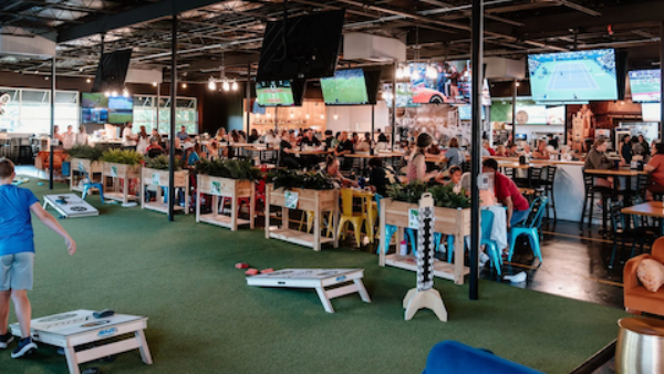 interior of The Yard showing tables and games
