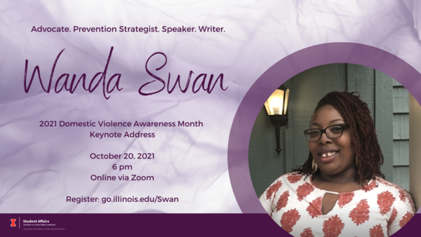 Wanda Swan, a black woman with medium length hair and glasses smiles at the camera.