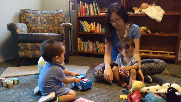 adults and children playing