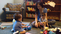 adults and children playing