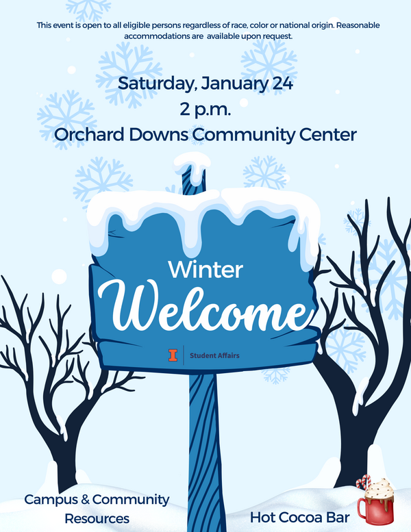 welcome sign and bare trees in winter