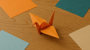 origami crane with paper near it