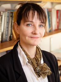 Picture of Ellen Moodie --- she is a white woman with blue eyes