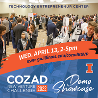 Image of students talking with judges at the Cozad demo showcase