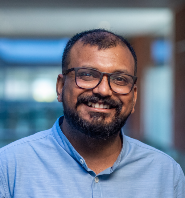 Dr. Abhishek Shrivastava person with black hair and glasses.