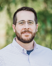 Dr. Jason McLellan - Person with short dark hair and glasses.