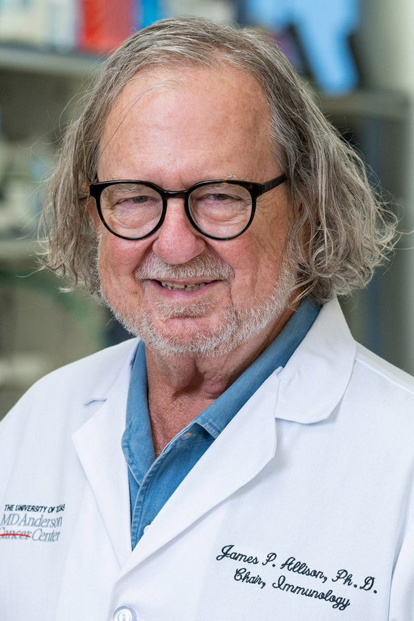 Picture of Dr. Allison. He has black frame glasses and a white lab coat.