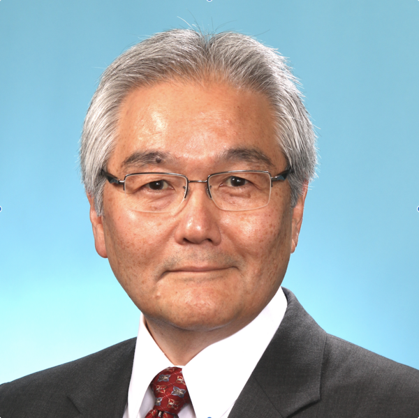 Picture of Dr. Wayne Yokoyama. He has silver-frame glasses, short grey hair, and is wearing a dark suit with white, collared shirt and pattern tie.