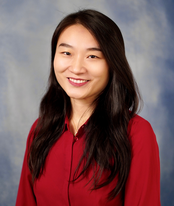 Female with Red Shirt and dark hair.